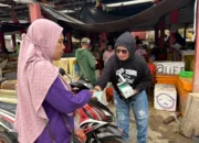 Wakil Ketua Komisi Masmina Bagikan 1.000 Masker di Pasar Basanohi Fogi