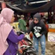 Wakil Ketua Komisi Masmina Bagikan 1.000 Masker di Pasar Basanohi Fogi